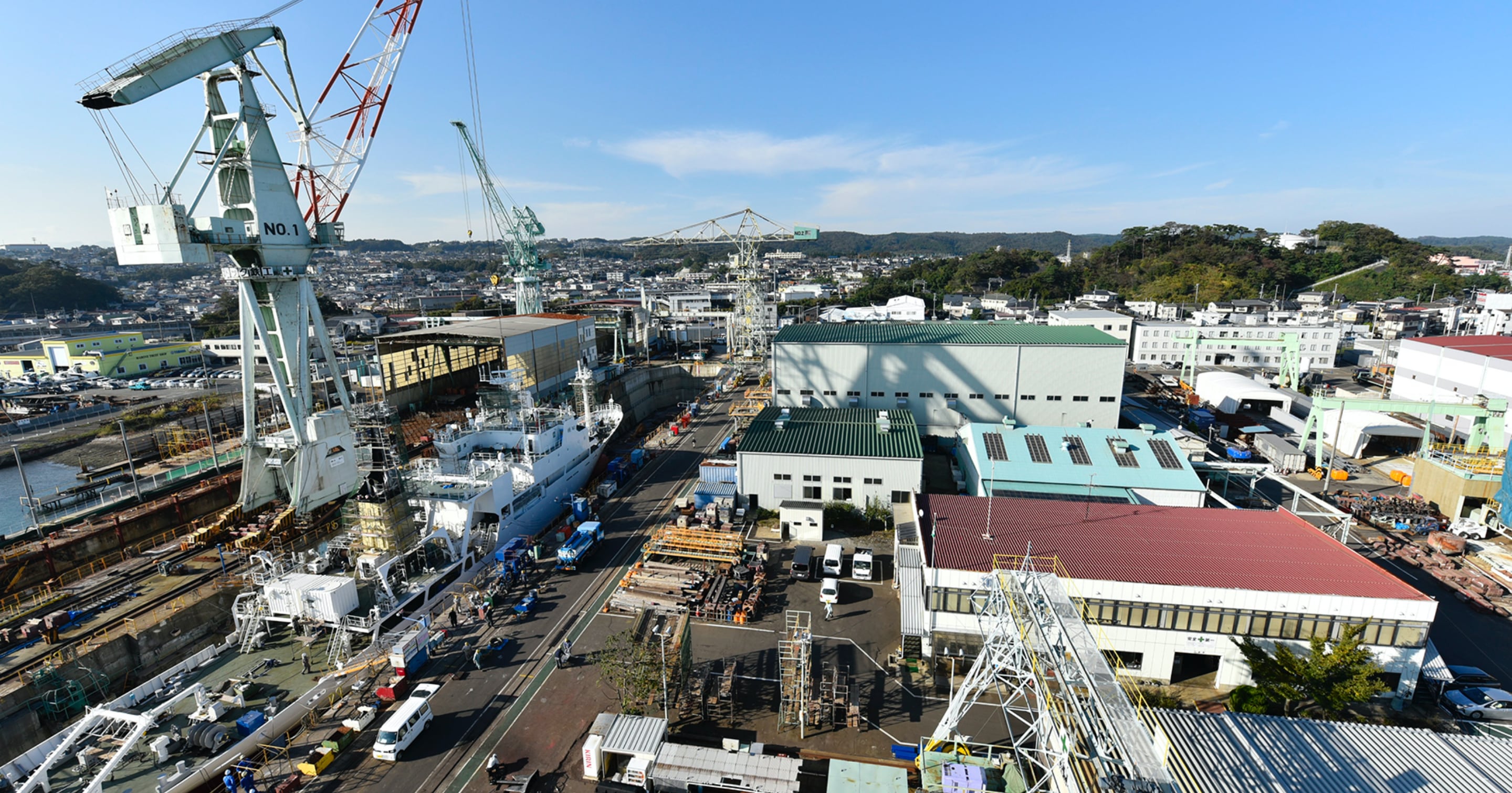 東北ドック鉄工株式会社　スライド